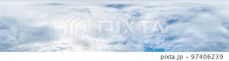 Seamless winter sky panorama on overcast day in spherical equirectangular format with complete zenith for use in 3D graphics, game and for composites in aerial drone 360 degree panoramas as a sky dome 97406239