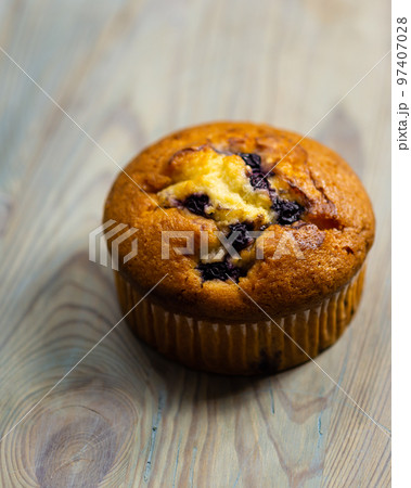 Blueberry muffin on rustic wooden background 97407028
