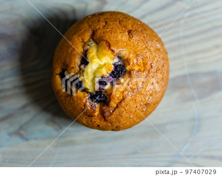 Blueberry muffin on rustic wooden background Blueberry muffin on rustic wooden background 97407029