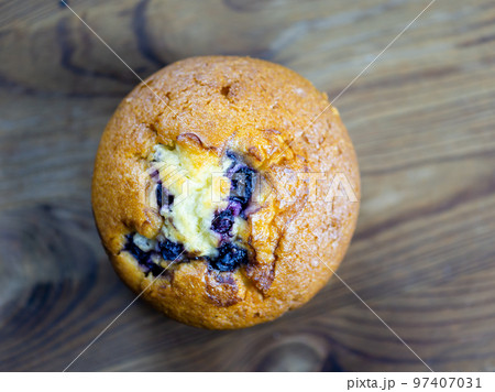 Blueberry muffin on rustic wooden background 97407031