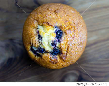 Blueberry muffin on rustic wooden background 97407032