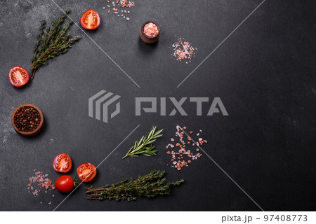 Fresh raw pork meat on the ribs with spices and herbs on a wooden cutting board 97408773