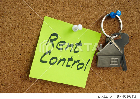 Key and sticker with inscription rent control pinned to the board. 97409683