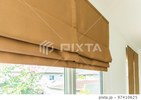 Roman blind curtain decoration in living room interior Roman blind curtain decoration in living room interior 97410625