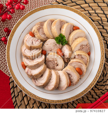 Delicious sliced chicken roll soaked in Chinese wine for lunar new year's dishes. 97410827
