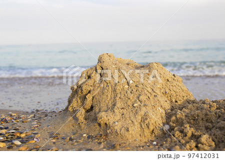 Sand castle on the beach of the sea Sand castle on the beach of the sea 97412031