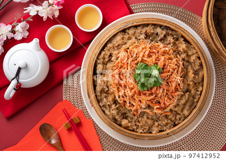 Delicious Chinese glutinous sticky oil rice cake named migao for lunar new year's dishes. Delicious Chinese glutinous sticky oil rice cake named migao for lunar new year's dishes. 97412952