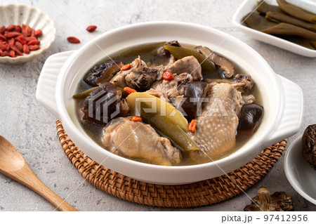 Delicious Taiwanese peeled green chili pepper chicken soup with mushroom and goji berry Delicious Taiwanese peeled green chili pepper chicken soup with mushroom and goji berry 97412956