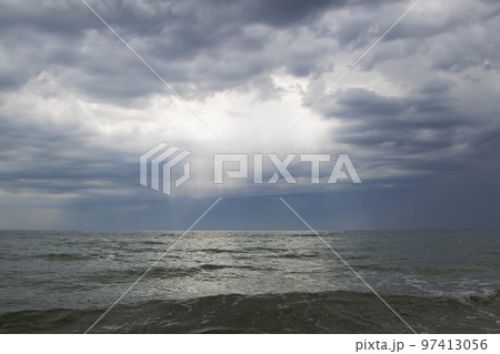 Seascape with clouds in the sky with waves 97413056