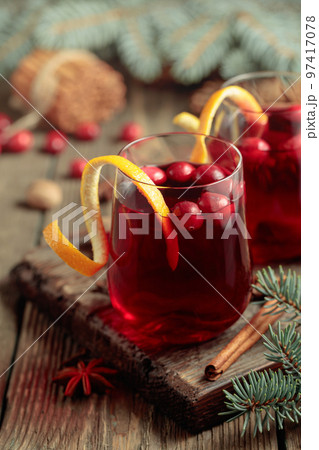 Christmas drink with spices and cranberries. Christmas drink with spices and cranberries. 97417078