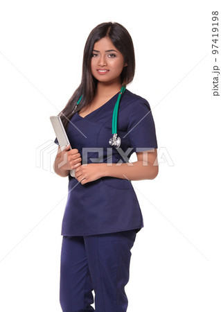 Young pretty doctor with a stethoscope and a medical history in her arms 97419198