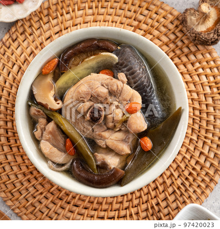 Delicious Taiwanese peeled green chili pepper chicken soup with mushroom and goji berry. 97420023