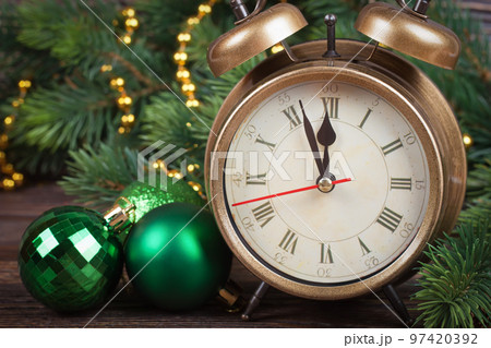 Christmas clock and fir branches 97420392