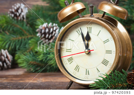 Christmas clock and fir branches Christmas clock and fir branches 97420393