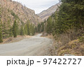A rocky road to a distant mountain village 97422727