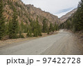 A rocky road to a distant mountain village 97422728