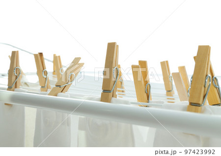 Drying rack with socks and clothes, isolated on white background 97423992