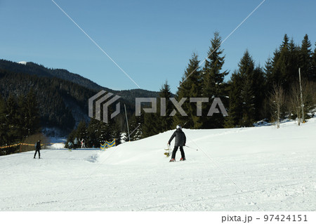 Ski slope in Carpathian mountains, ski season concept Ski slope in Carpathian mountains, ski season concept 97424151