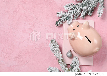 Concept of Christmas finance with piggy bank, space for text Concept of Christmas finance with piggy bank, space for text 97424300
