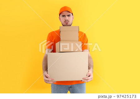 Concept of delivery, surprise, gift, young people opened a cardboard box Concept of delivery, surprise, gift, young people opened a cardboard box 97425173