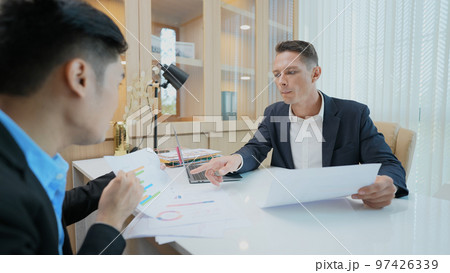 Business concept of 4k Resolution. The manager is having a meeting with a partner in the office. Business concept of 4k Resolution. The manager is having a meeting with a partner in the office. 97426339