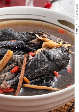 Delicious silky chicken soup with Chinese herbal medicine 97426580