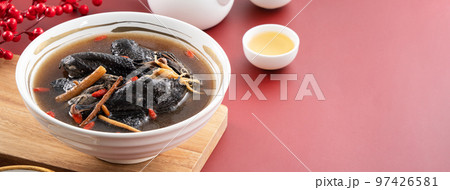 Delicious silky chicken soup with Chinese herbal medicine 97426581