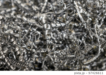Close-up scene of metal materials scrap from turning process. Close-up scene of metal materials scrap from turning process. 97426611