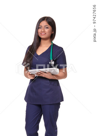 Young pretty doctor with a stethoscope and a medical history in her arms Young pretty doctor with a stethoscope and a medical history in her arms 97427656