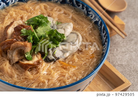 Delicious oyster and intestine vermicelli in a bowl 97429505