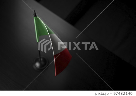 Small national flag of the Italy on a black background Small national flag of the Italy on a black background 97432140