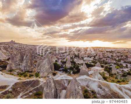 Beautiful stunning view of the mountains of Cappadocia and cave houses. Turkey Beautiful stunning view of the mountains of Cappadocia and cave houses. Turkey 97440485