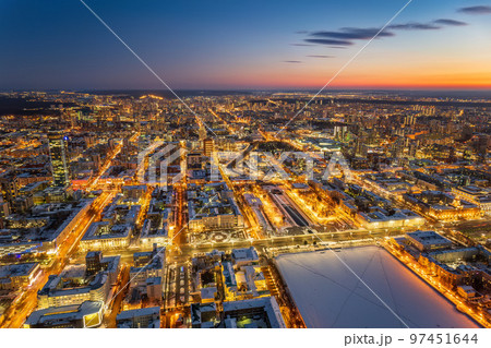 Embankment of the central pond and Plotinka in Yekaterinburg at winter sunset. The historic center of the city of Yekaterinburg, Russia, Aerial View Embankment of the central pond and Plotinka in Yekaterinburg at winter sunset. The historic center of the city of Yekaterinburg, Russia, Aerial View 97451644