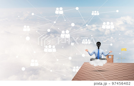 Concept of security and privacy protection with camera headed man meditating 97456402