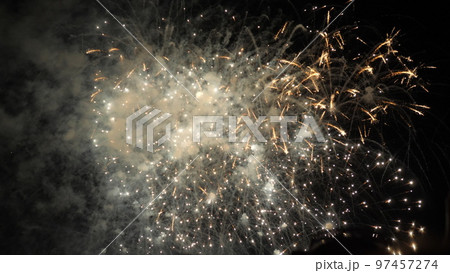 fireworks background. festive fireworks sky. new year, independence day, christmas, birthday. explosion colored lights. fiery flame sky. happy holiday. traditional holiday festival. fire spark effect 97457274