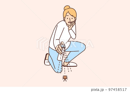 Anxious woman spray cockroach at home Anxious woman spray cockroach at home 97458517