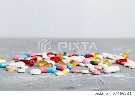 Collection Of Various Medical Tablets And Pills. Assorted pharmaceutical medicine pills, tablets and capsules on table background. Heap of assorted various medicine tablets. Health care Collection Of Various Medical Tablets And Pills. Assorted pharmaceutical medicine pills, tablets and capsules on table background. Heap of assorted various medicine tablets. Health care 97466231