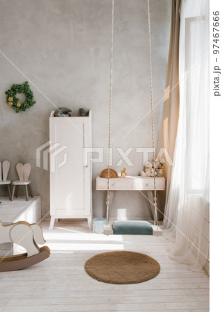 Modern interior of a children's bedroom. Wardrobe, chest of drawers and toys 97467666