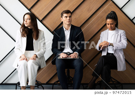 Business people waiting for job interview Business people waiting for job interview 97472015