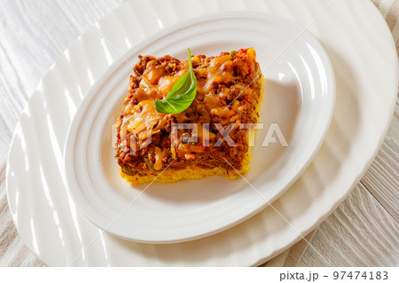 portion of tasty Cajun Beef Cornbread Casserole 97474183