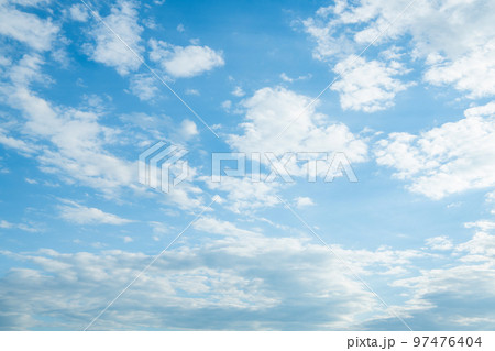 cloudy blue sky with white fluffy clouds. cloudscape background cloudy blue sky with white fluffy clouds. cloudscape background 97476404