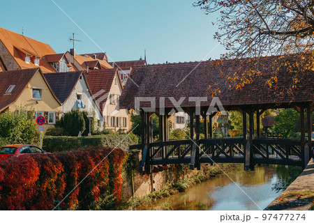 Bridge over the Metter in Bietigheim-Bissingen. Little greek in Bietigheim-Bissingen with autumn colors. Metter, a river in Bietigheim-Bissingen 97477274