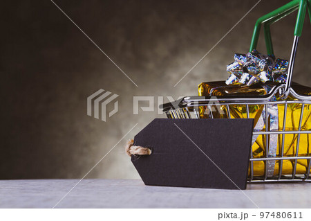 Christmas sale. Copyspace on the price tag. Buying gifts on sale. 97480611