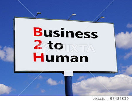 B2H business to human symbol. Concept words B2H business to human on big billboard on a beautiful blue sky and clouds background. Business and B2H business to human concept. Copy space. B2H business to human symbol. Concept words B2H business to human on big billboard on a beautiful blue sky and clouds background. Business and B2H business to human concept. Copy space. 97482339