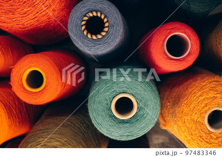 Composition of colorful vibrant wool threads from above. Composition of colorful vibrant wool threads from above. 97483346