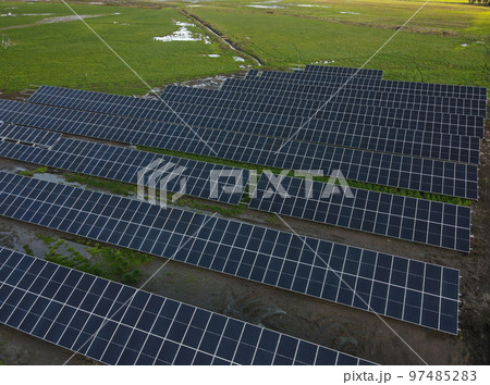 Aerial view of solar power plant solar panels. Electric panels for producing clean ecologic energy. 97485283