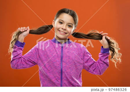 Easy tips making hairstyle for kids. Small child long hair. Charming beauty. Girl active kid with long gorgeous hair. Strong and healthy hair concept. How to treat curly hair. Nice and tidy hairstyle Easy tips making hairstyle for kids. Small child long hair. Charming beauty. Girl active kid with long gorgeous hair. Strong and healthy hair concept. How to treat curly hair. Nice and tidy hairstyle 97486326