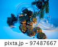 Christmas table decoration with Christmas sweets cookies, fir tree branches. Winter greeting card template. 97487667