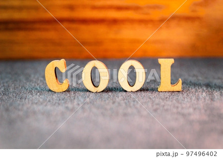 COOL文字 黒色シートの上に木材のアルファベット文字でCOOL COOL文字 黒色シートの上に木材のアルファベット文字でCOOL 97496402