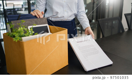 Concept of leaving job, Female employee sending resignation letter to executive when changing job 97501035